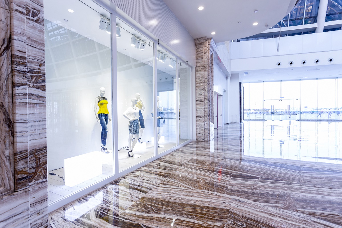 mannequins in fashion shop display window